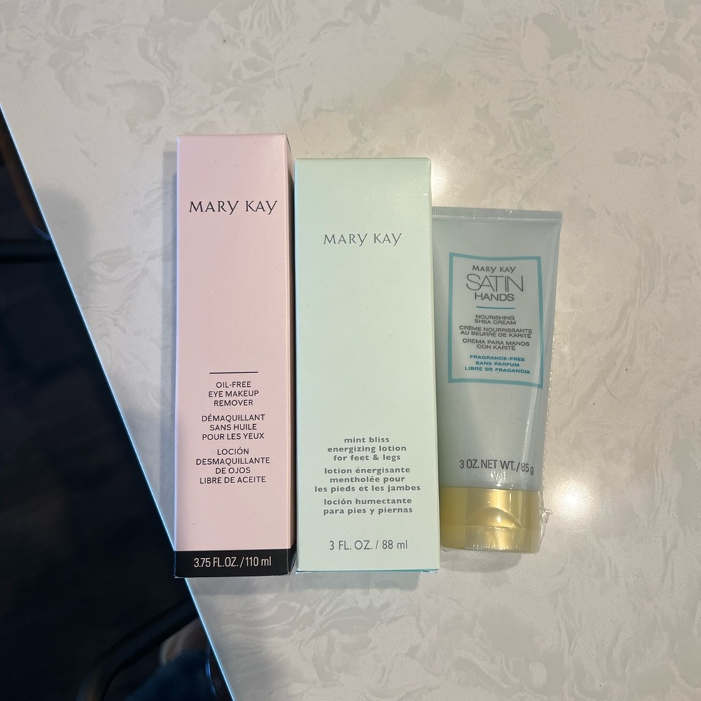 mary kay product trio: hand cream, lotion, makeup remover